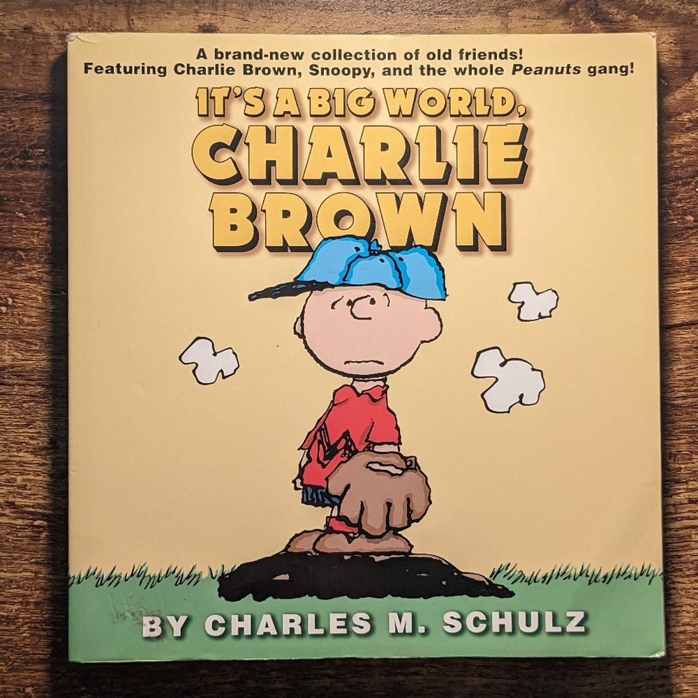 "IT'S A BIG WORLD, CHARLIE BROWN" by CHARLES M SCHULZ (2001) Comic Strip Humor